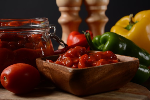 a jar of stewed salad with pepper and tomato lecho traditional hungarian dish - Венгерское лечо