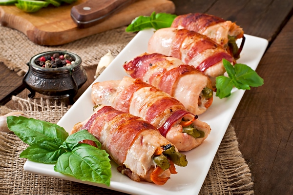 delicious chicken rolls stuffed with green beans carrots wrapped strips bacon - Кабачки в беконе