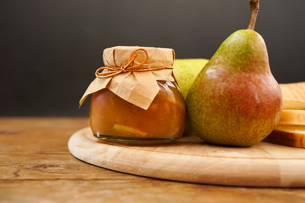 delicious pear jam and fresh fruits on wooden cutting board homemade marmalade - Фрукты, ягоды