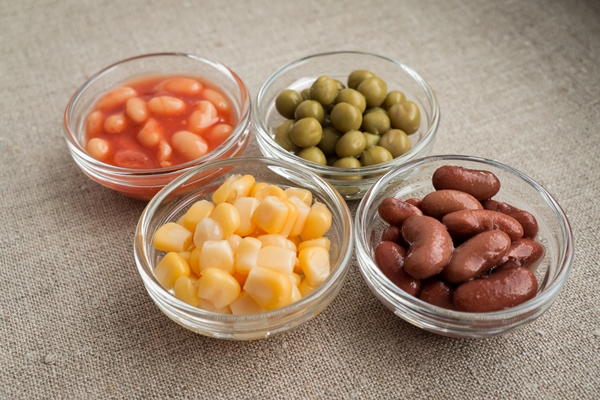 green peas corn and preserved beans in glass bowls - Салат «Мазурка»