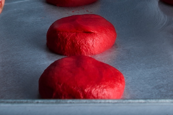 lati baker preparing the dough and baking colored brioche breads and cookies in his humble bakery 1 - Австралийский овощной хлеб