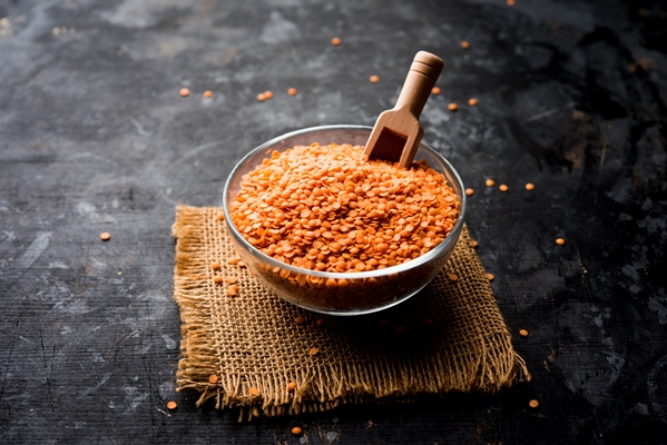 red lentil or lal masoor ki dal in a bowl selective focus - Беляши с чечевичной начинкой