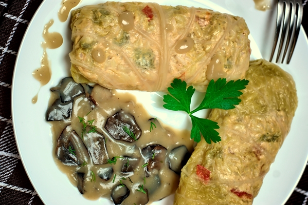 stuffed cabbage rolls with rice and chicken meat in forest mushroom sauce - Постные голубцы