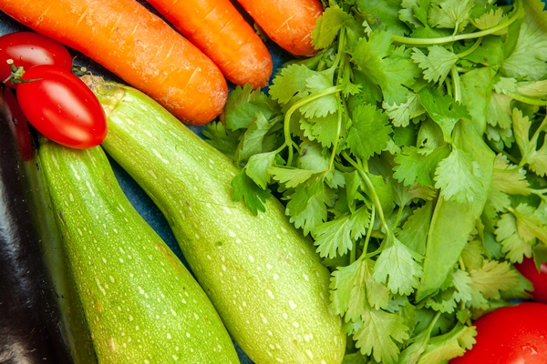 top view vegetables carrot zucchini cherry tomatoes parsley aubergines - Булгур с овощами