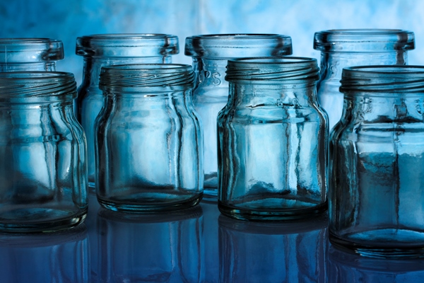 a group of bottle on blue background 1 - Клубника в собственном соку