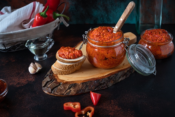 ajvar traditional balkan appetizer in a glass jar - Грибная аджика