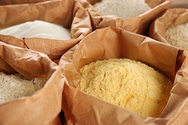 bags with different types of flour closeup - Постные кукурузные блины