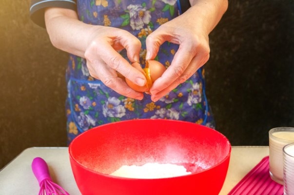 baking ingredients and utensils for cooking sponge cake process cooking sponge cake woman breaks an egg in the dough 149384 176 - Пасхальный агнец