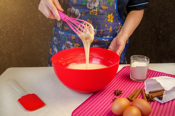 baking ingredients and utensils for cooking sponge cake process cooking sponge cake woman mixing the dough 2 - Пасхальный агнец