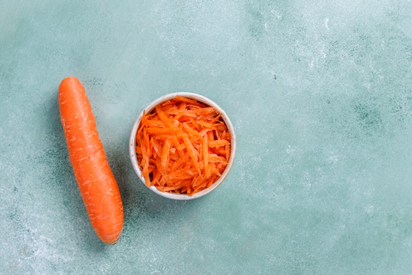 different cuts of carrot in bowls 1 - Рассольник с перловкой на зиму
