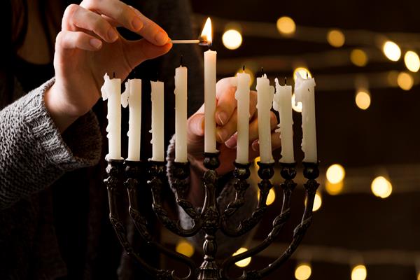 front view of hanukkah candle holder concept - Библия о пище