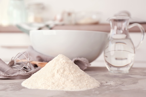 heap of flour and kitchenware on light table - Постные блины на фасолевом отваре