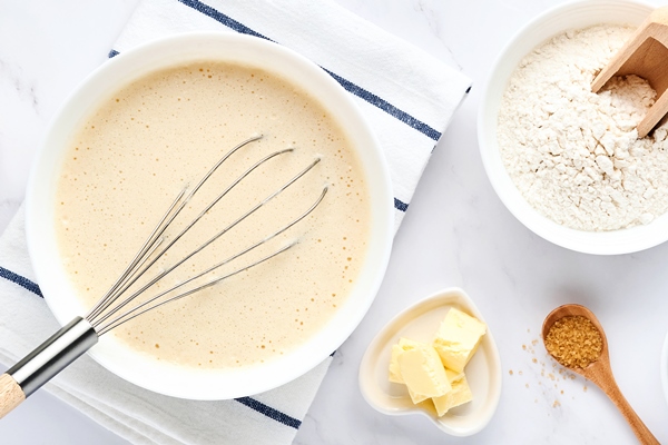 preparation of dough for home pancakes for breakfast ingredients on table 1 - Постные медовые блинцы на соевом молоке