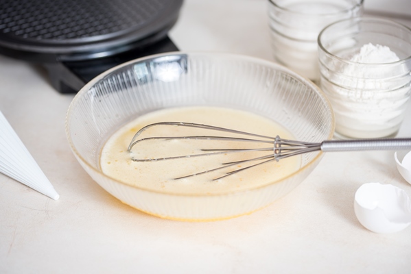 preparation of the dough a measurement of the amount of ingredients in the recipe ingredients for the dough flour eggs rolling pin whisk milk butter cream - Пасха с какао, миндалём и изюмом