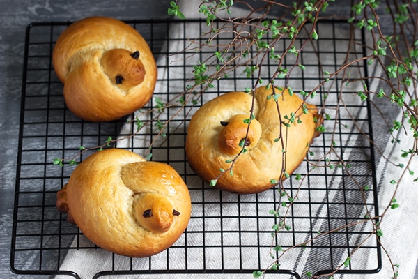 traditional spring bird shaped lean buns coated with sweet syrup - Жаворонки