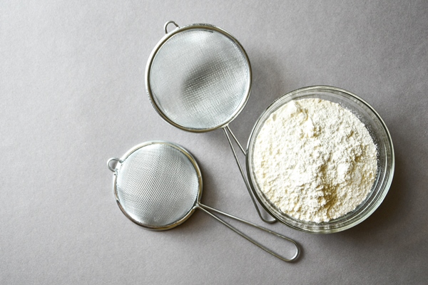 flour prepared for baking on gray background copy space for text recipe ingredient - Полезный хлеб с крапивой
