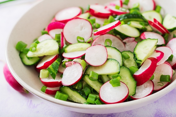 fresh salad of cucumbers radishes and green onion - Витаминный перекус