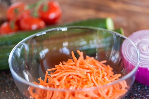 fresh shredded carrot for spring salad with organic veggies - Каша из гречневой сечки