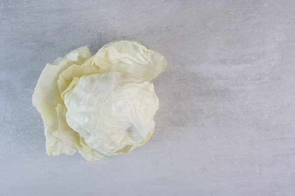 fresh white cabbage on stone surface high quality photo - Ленивые голубцы, постный стол