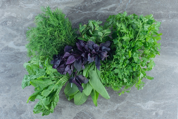 purple basil and with parsley on the marble table - Суп грибной с рисом, постный стол