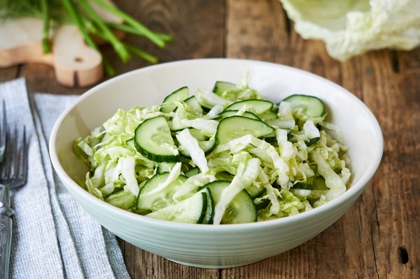 salad with fresh chinese cabbage cucumbers bowl - Салат из капусты и огурцов