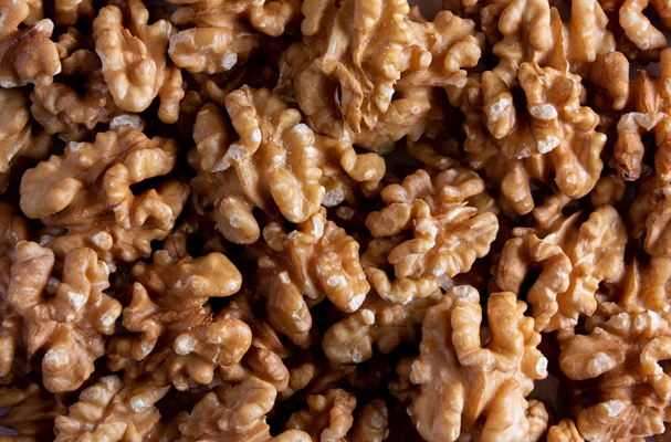 walnuts background texture selective focus - Фасоль отварная с ореховым соусом, постный стол