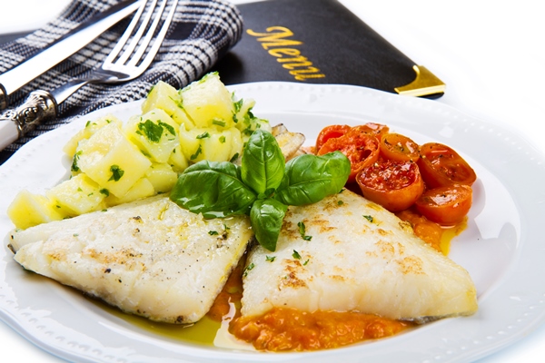 white dish of fresh black cod with potatoes and tomatoes sauce - Треска с картофелем, постный стол