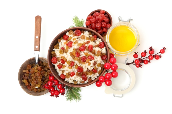 concept of orthodox christmas food kutya isolated on white background 1 - Кутья рисовая с мёдом и сахаром