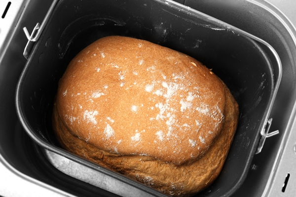 fresh crusty loaf in bread maker closeup - Гречневый хлеб в мультиварке