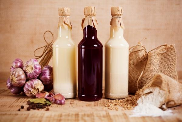 glass bottles of sourdough for homemade easter sour soup - Мамин квас