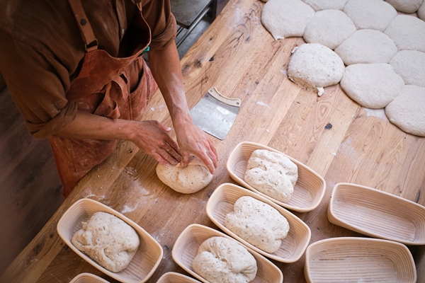 leavened bread dough in the moulds resting to be baked - Чиабатта