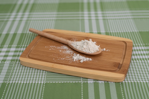 table with wooden spoon with flour - Щи валаамские из свежих грибов