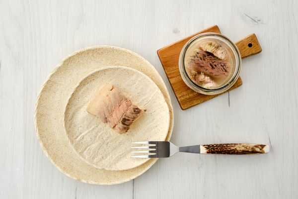 top view of canned sturgeon on a plate - Ботвинья (способ первый)