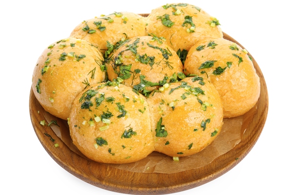 traditional pampushka buns with garlic and herbs on white background - Пампушки с чесноком к борщу