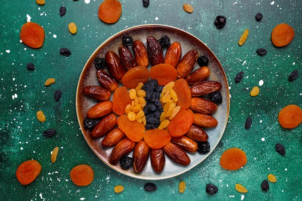 various dried fruits dates plums raisins and figs - Суп фруктовый