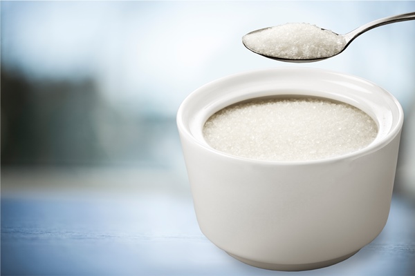 white sugar in bowl on background - Посадский квас