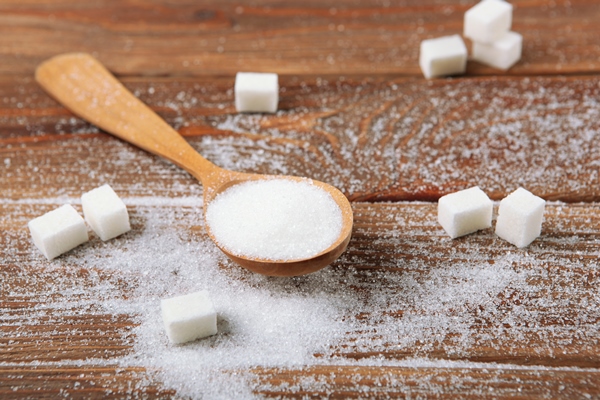 white sugar on the table on a light background closeup - Черничный суп