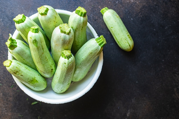 zucchini vegetable harvest organic farm product on the table healthy meal copy space food - Драники с кабачками и манкой