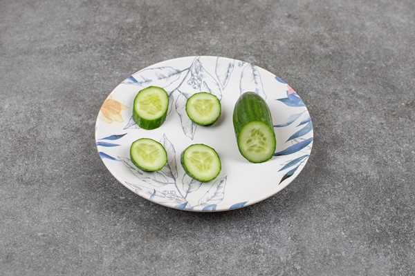 sliced fresh organic cucumber on white plate - Бутерброды "Золотая рыбка" (видео)