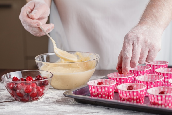 baking trays with raw muffin dough in paper cases - Постные маффины на соке