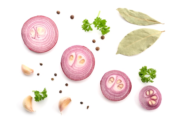 composition with sliced red onion garlic and spices on white - Постные тако с фасолью и овощами