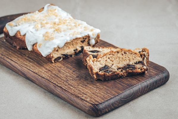 healthy homemade carrot cake with prunes and peanuts on a wooden board 1 - Постный кекс с черносливом