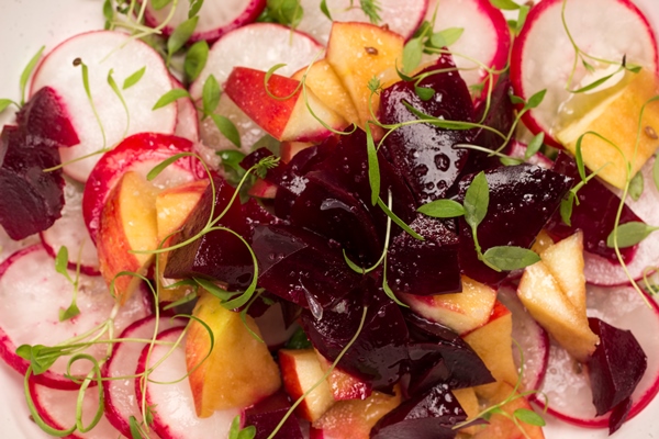 nutritious salad of sliced boiled beets sliced radish and apples with young microgreen sprouts - Закуска из свёклы, яблок и редиса