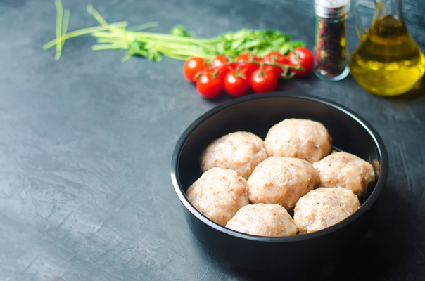 raw homemade steamed meatballs with chicken and buckwheat - Рыбный рассольник с фрикадельками