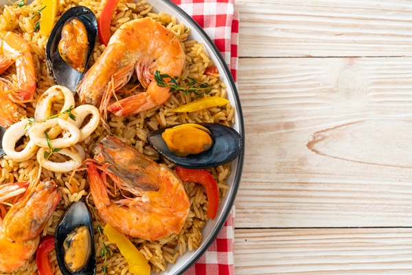 seafood paella with prawns clams mussels on saffron rice spanish food style - Постная паэлья