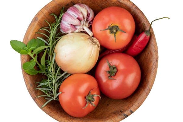 tomatoes garlic peppers and herbs on a bowl isolated over - Постные фаршированные шампиньоны