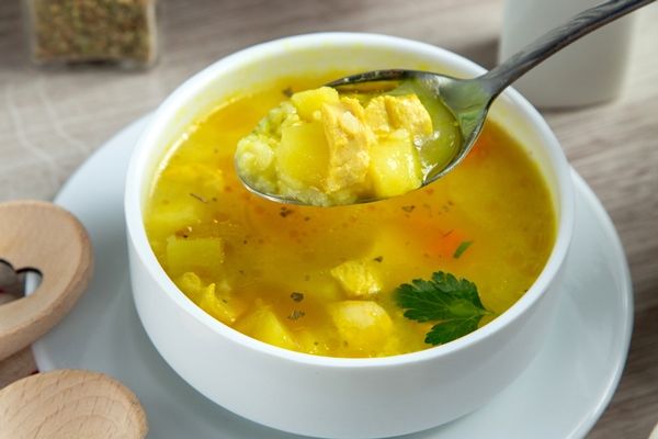 chiken soup potato spices rice side view - Суп картофельный с крупой и мясом