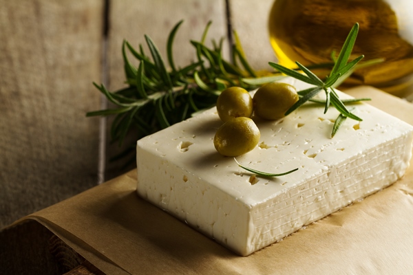 fresh tasty greek green olives with cheese feta goat cheese closeup mediterranean food - Омлет-страта по-американски