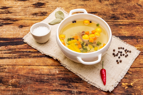 transparent duck broth with dumplings and vegetables traditional bouillon healthy food - Правила приготовления прозрачных супов