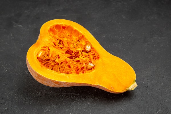 front view sliced fresh pumpkin on dark table fruit orange photo - Монастырская кухня: луковые котлеты, пшенная каша (видео)